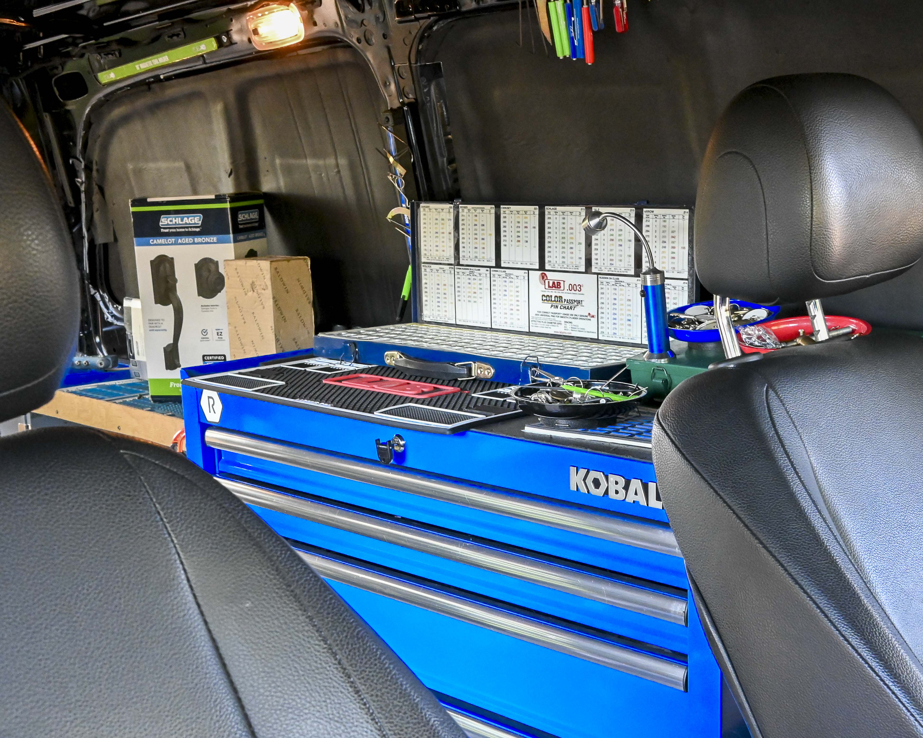 Organized CLS - Chandler Locksmith Services van interior with key blanks and tools